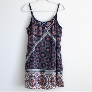 Spaghetti strap, navy patterned dress, crisscross